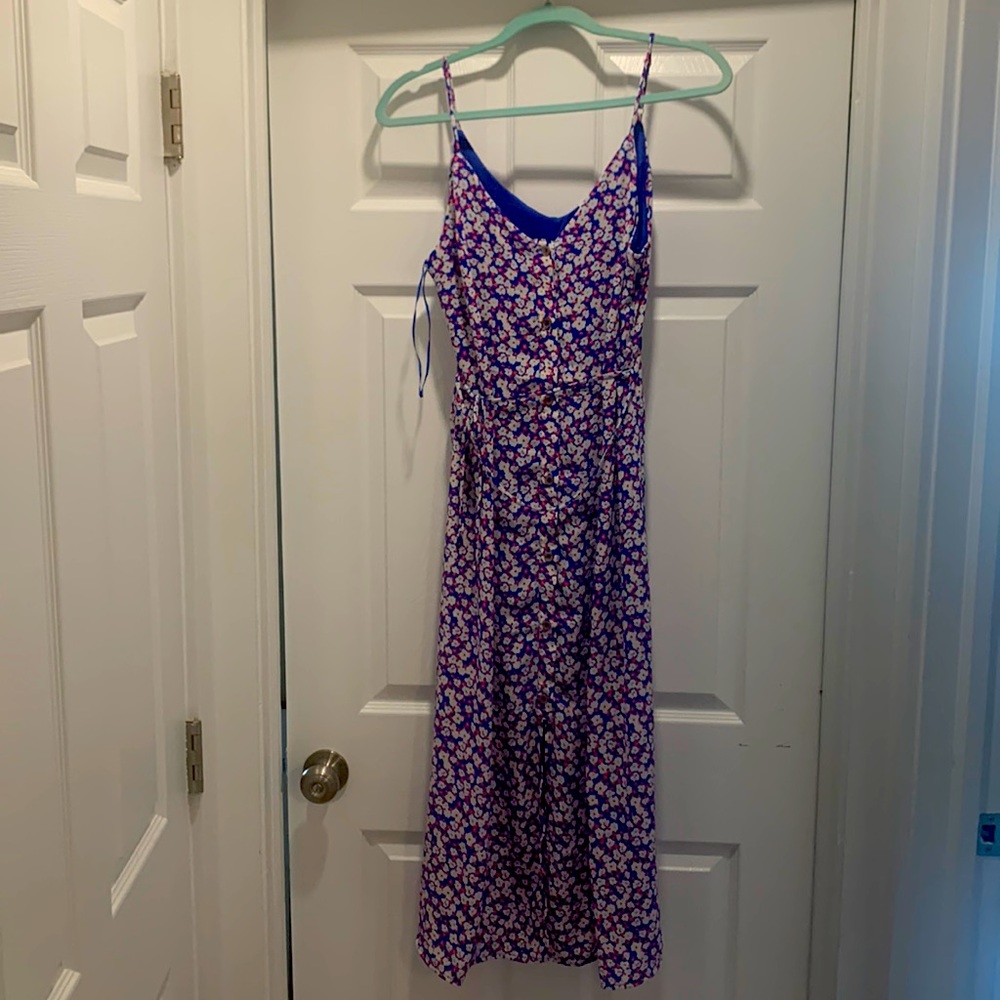Brand new. Summer floral dress. Mid length. Size medium.